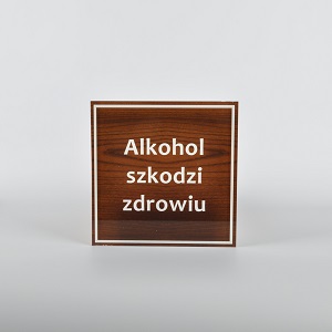 brązowa tabliczka informująca o szkodliwości alkoholu